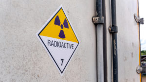 radiation warning sign on transport label Class-7 on the door of the transport truck container